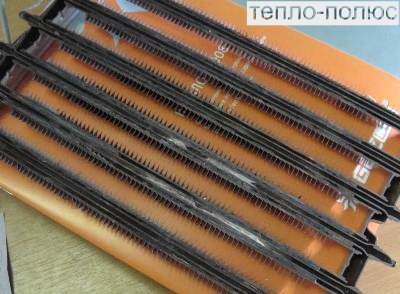 теплообмінник у розрізі , забитий накип`ю та солями